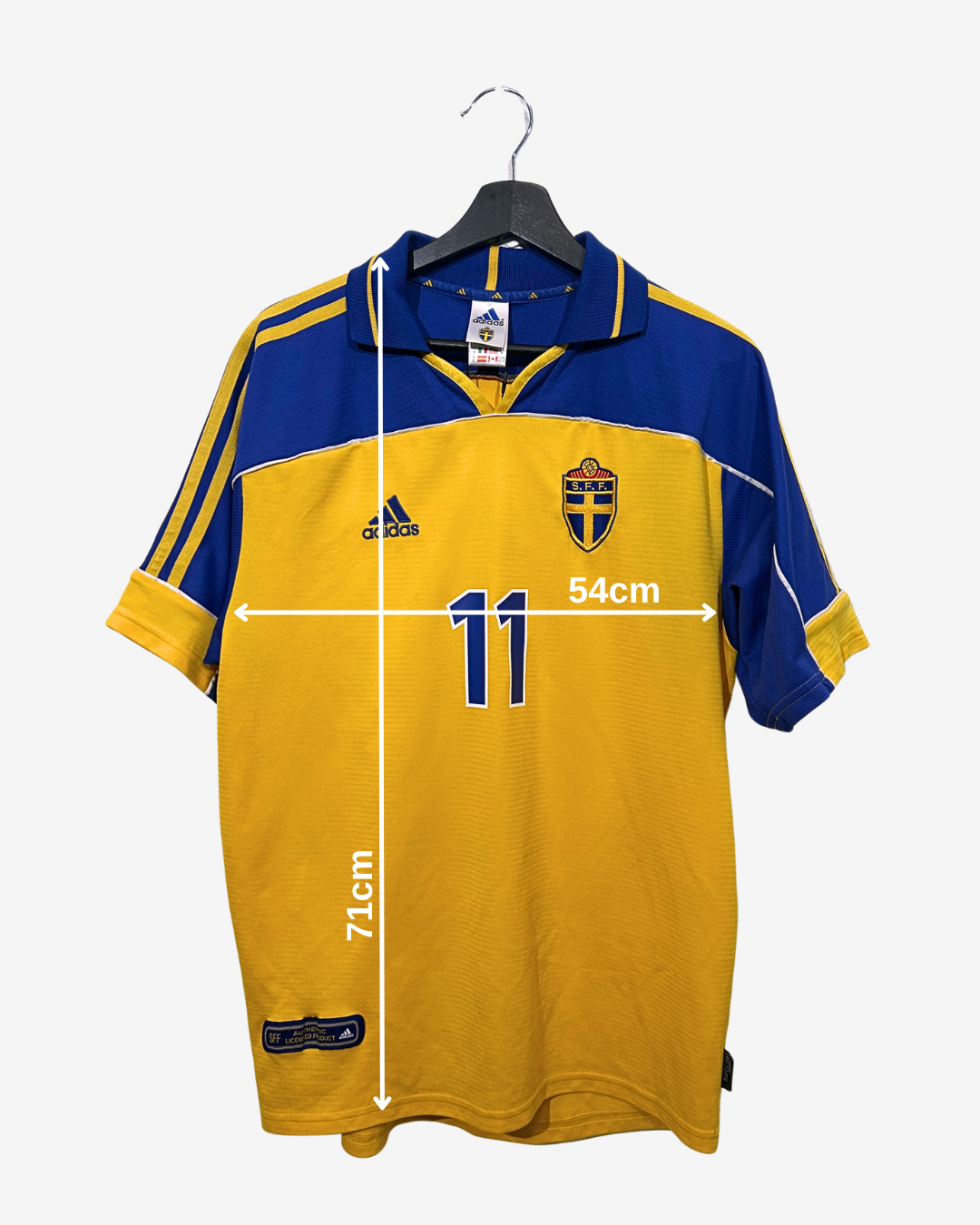 Yellow and blue sports jersey with measurements on a white background