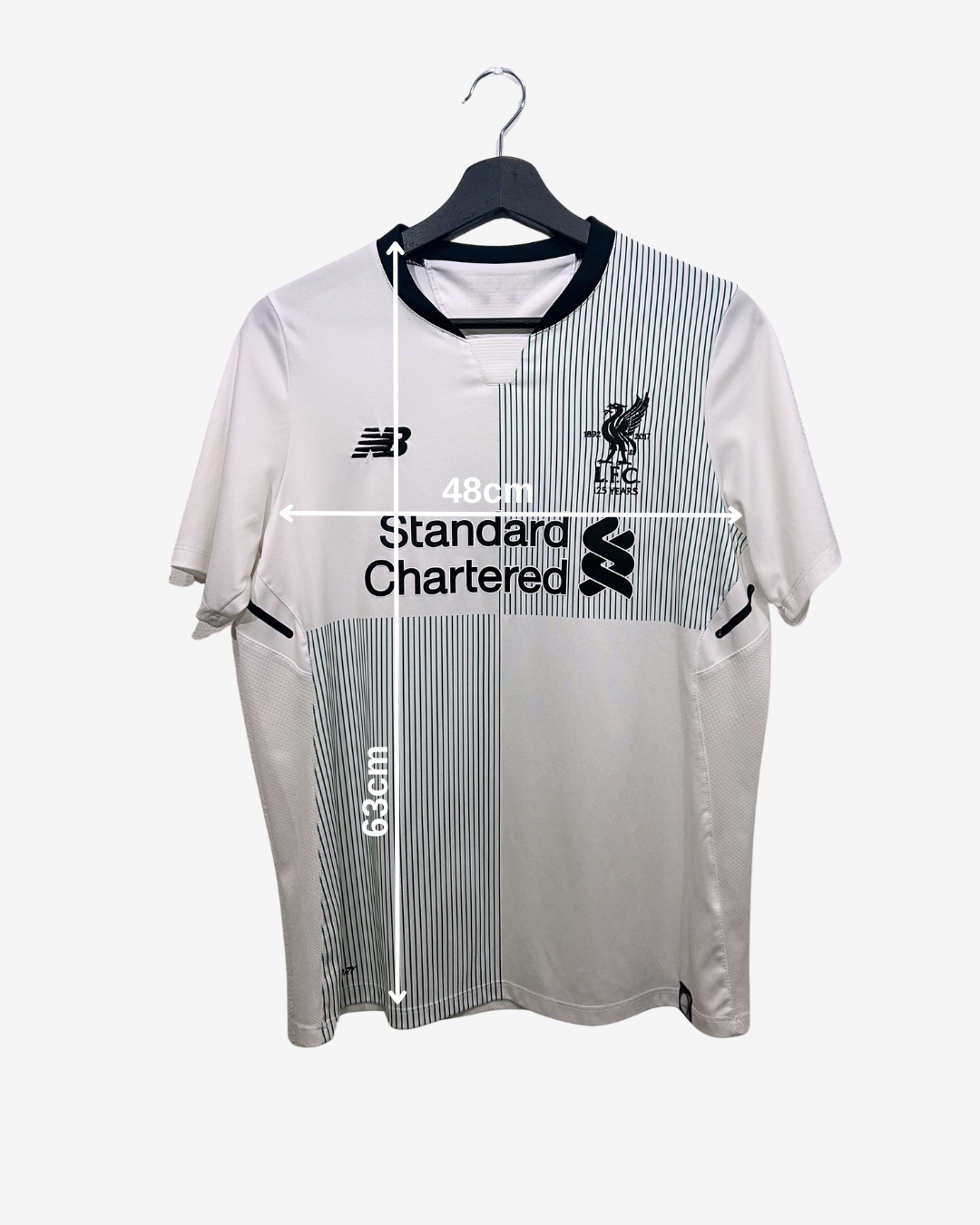 White sports jersey with branding measurements on a white background