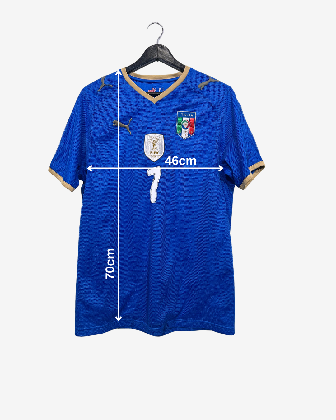 Blue sports jersey with measurements on a white background