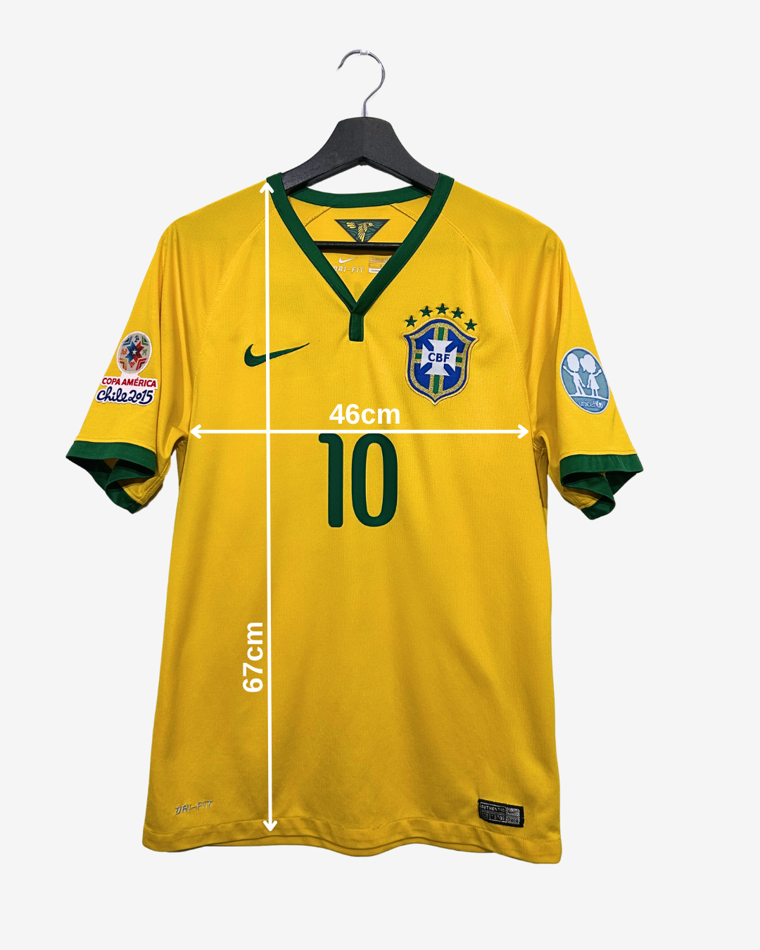Yellow soccer jersey with green accents on a hanger, featuring brand logos and measurements.