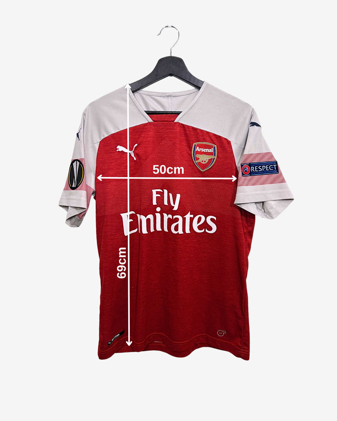 Red and white Arsenal football jersey with measurements on a white background