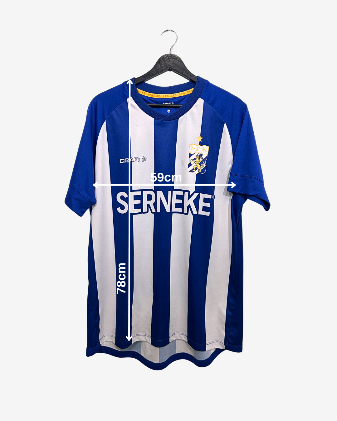 Blue and white striped sports jersey on a hanger with measurements indicated.
