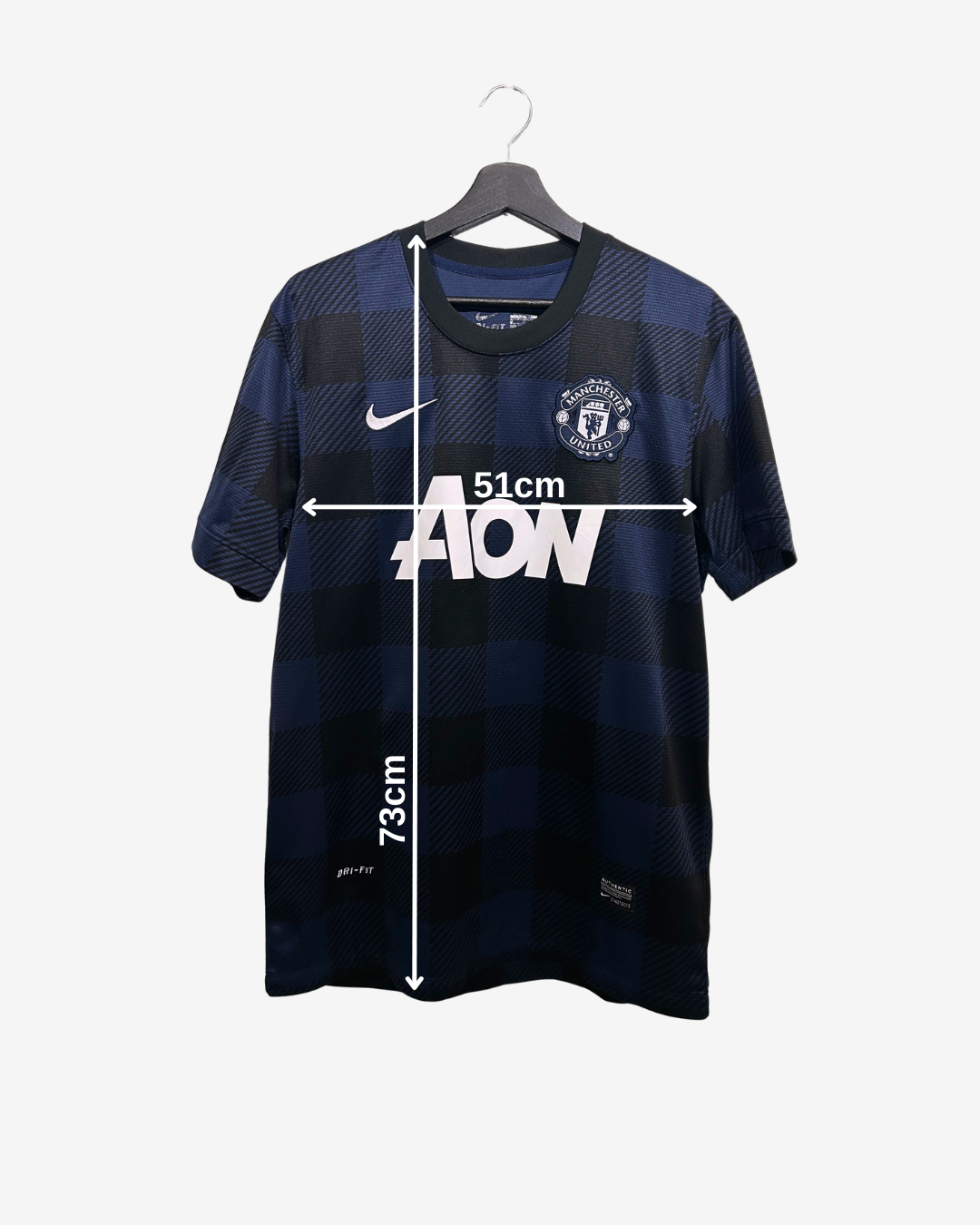 Navy blue sports jersey with measurements on a white background