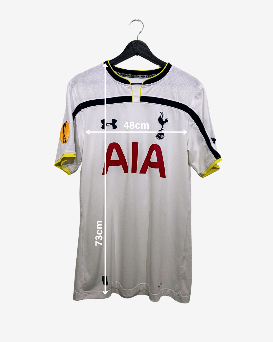 White sports jersey with measurements on a white background