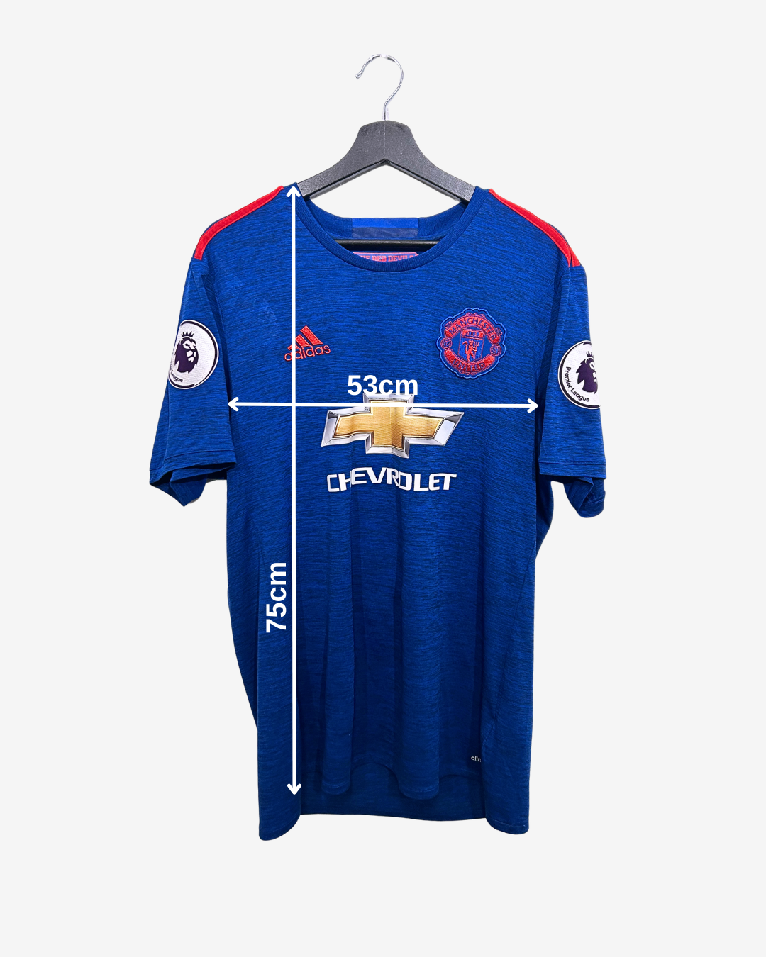 Blue sports jersey with brand logos on a hanger, showing measurements.