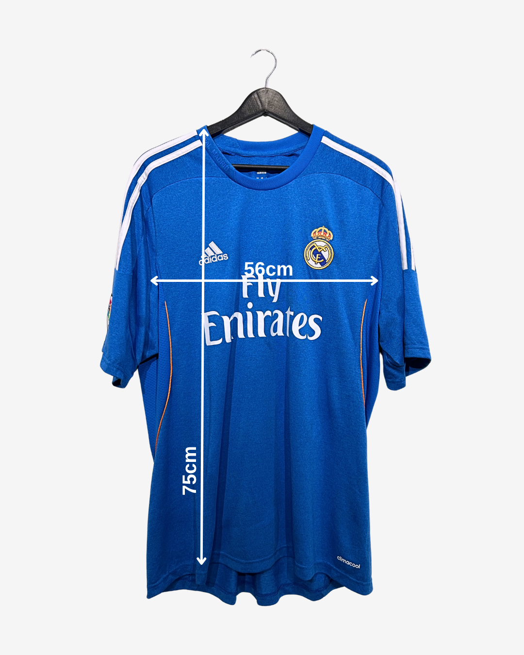 Blue sports jersey with branding on a hanger, showing measurements.