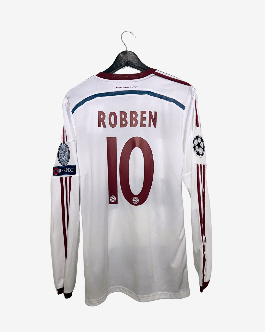 White soccer jersey with 'Robben 10' on a hanger against a white background