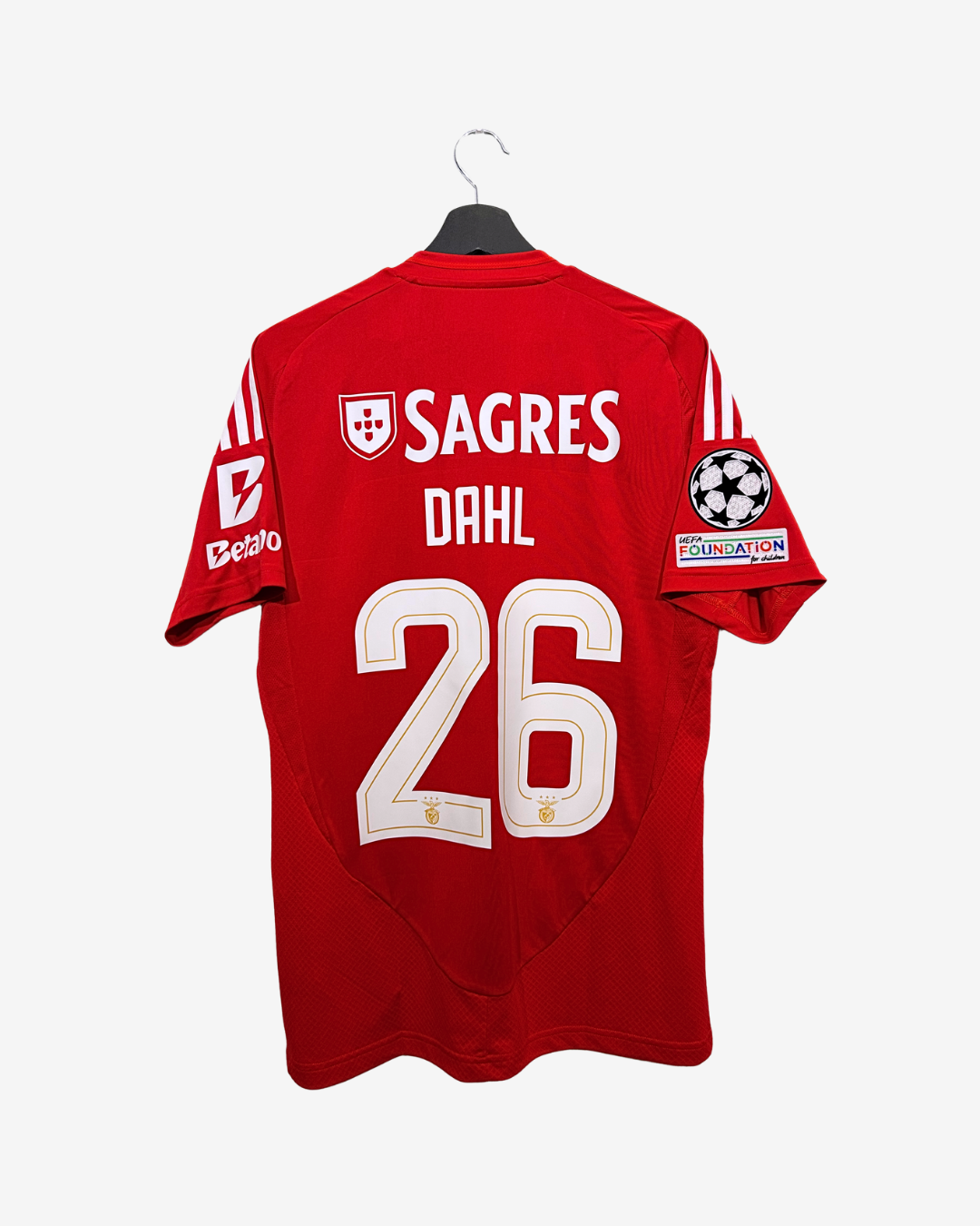 Red sports jersey with 'Sagres' and 'Dahl 26' on a white background
