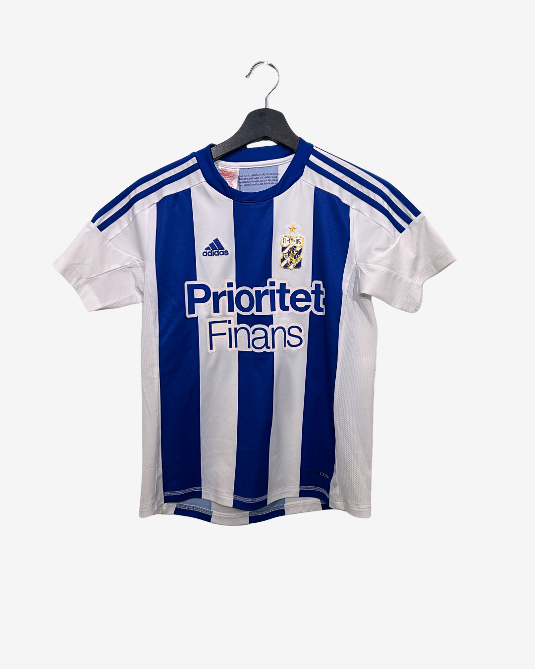 White and blue striped sports jersey with Adidas logo on a hanger against a white background