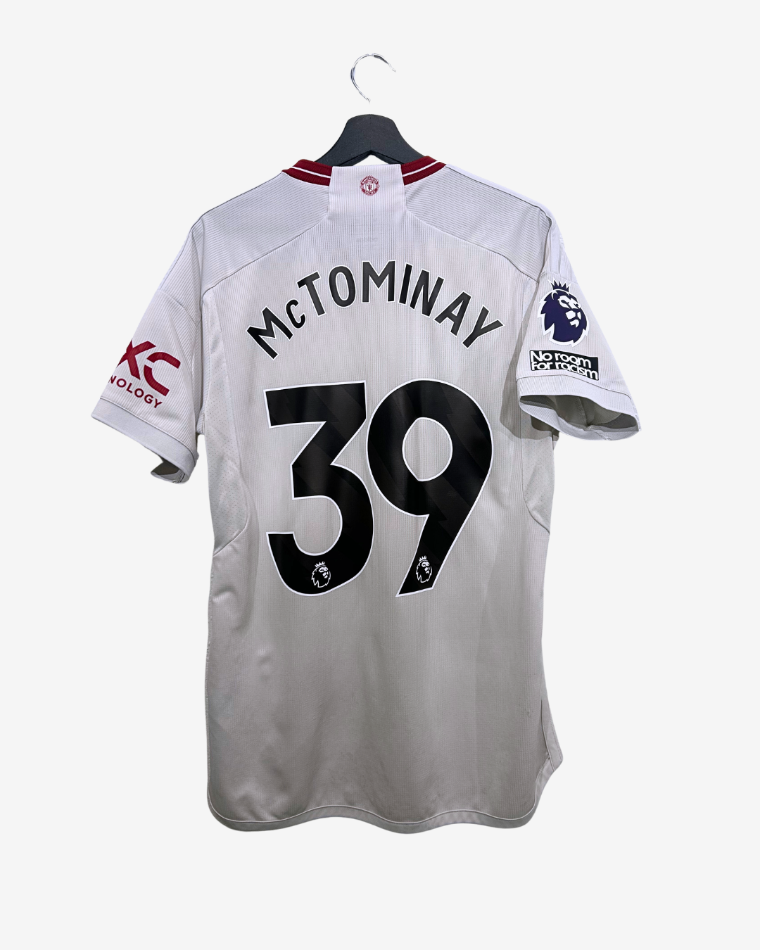 White sports jersey with 'McTominay 39' on a white background