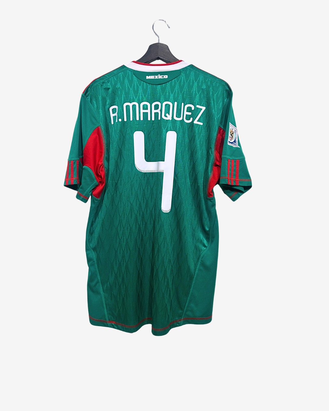 Green sports jersey with red accents, featuring the name 'A. Marquez' and number '4', on a white background.
