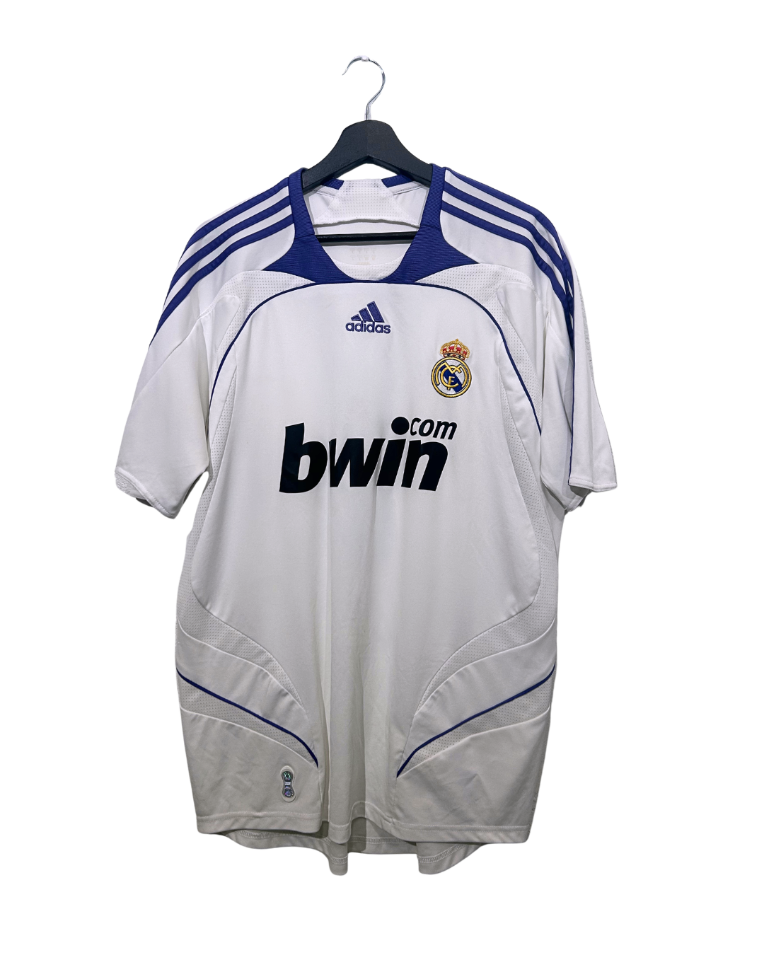 White sports jersey with blue accents on a hanger against a white background
