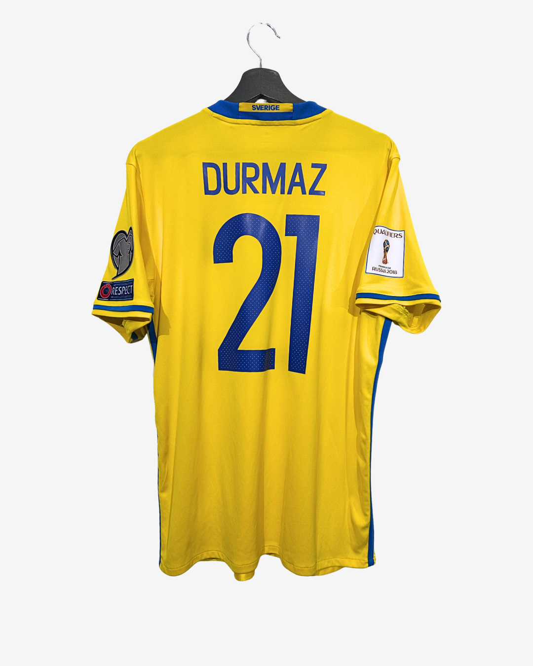 Yellow sports jersey with blue accents, number 21, and name 'Durmaz' on a white background.