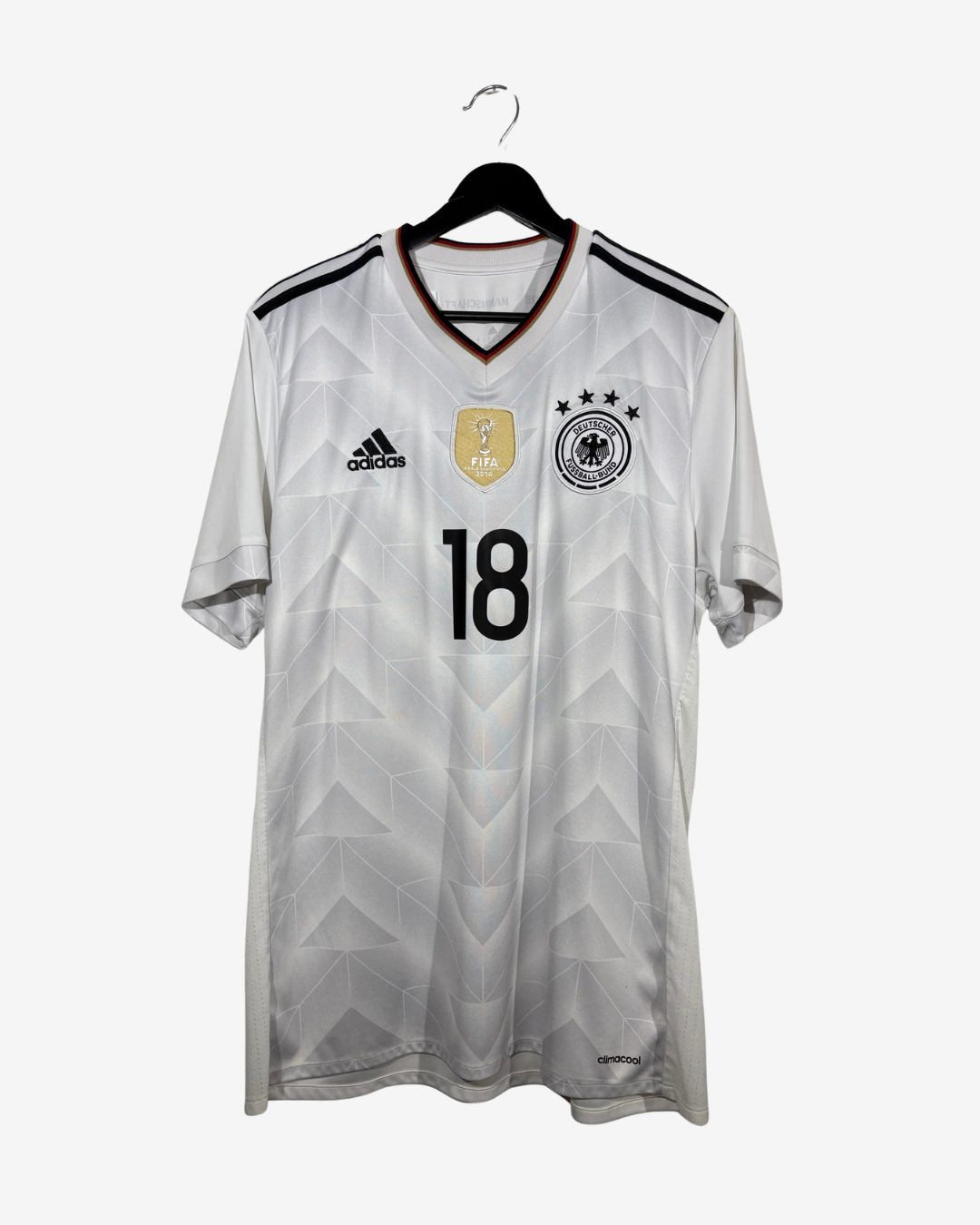 A white Adidas Germany national football team jersey with the number 18, hanging on a black hanger against a light gray background.