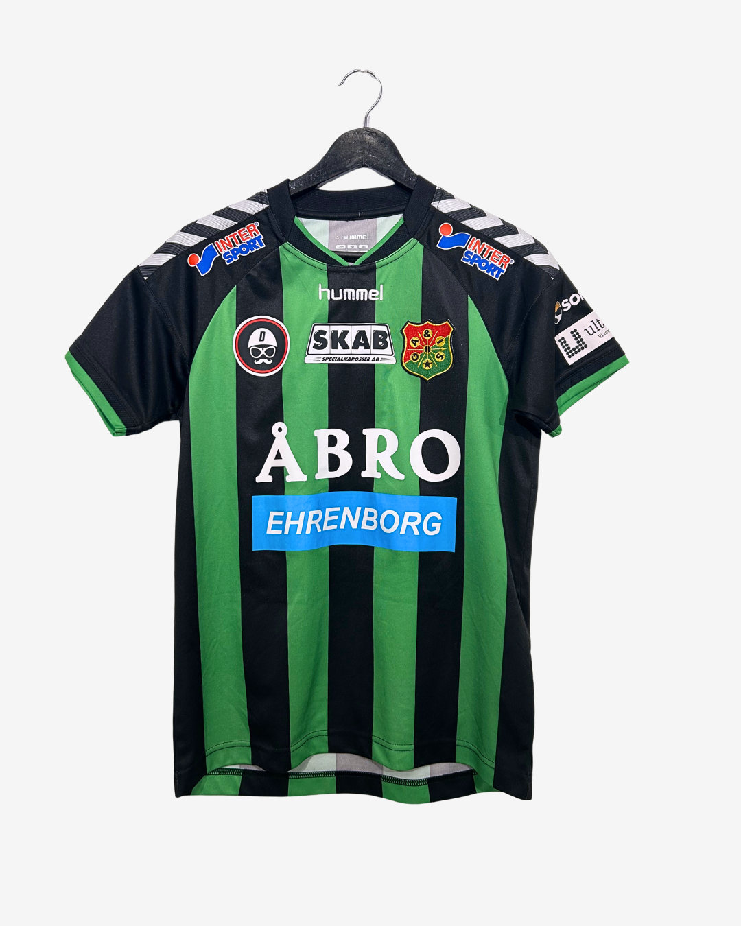 Green and black sports jersey with various logos on a white background