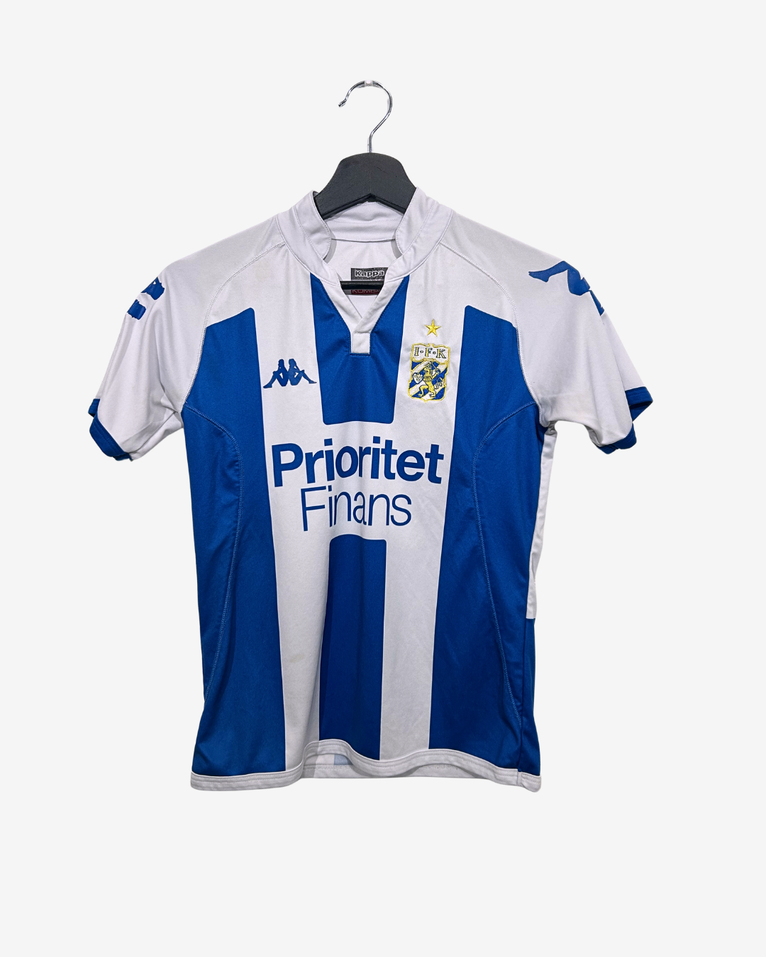 Blue and white sports jersey on a hanger with visible branding.