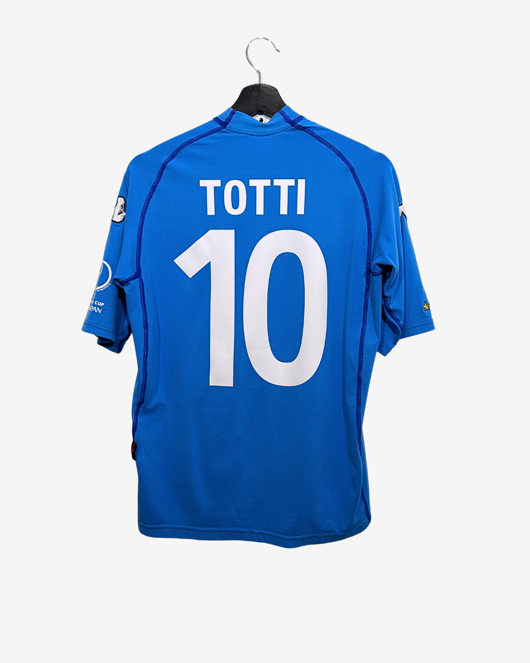 Blue sports jersey with 'Totti' and number '10' on a white background