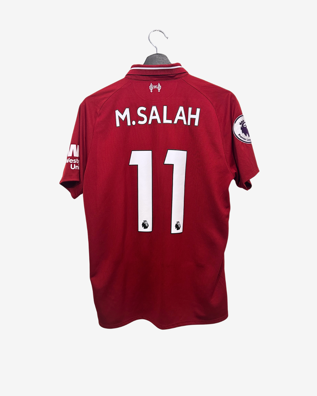 Red sports jersey with 'M. Salah' and number '11' on a white background