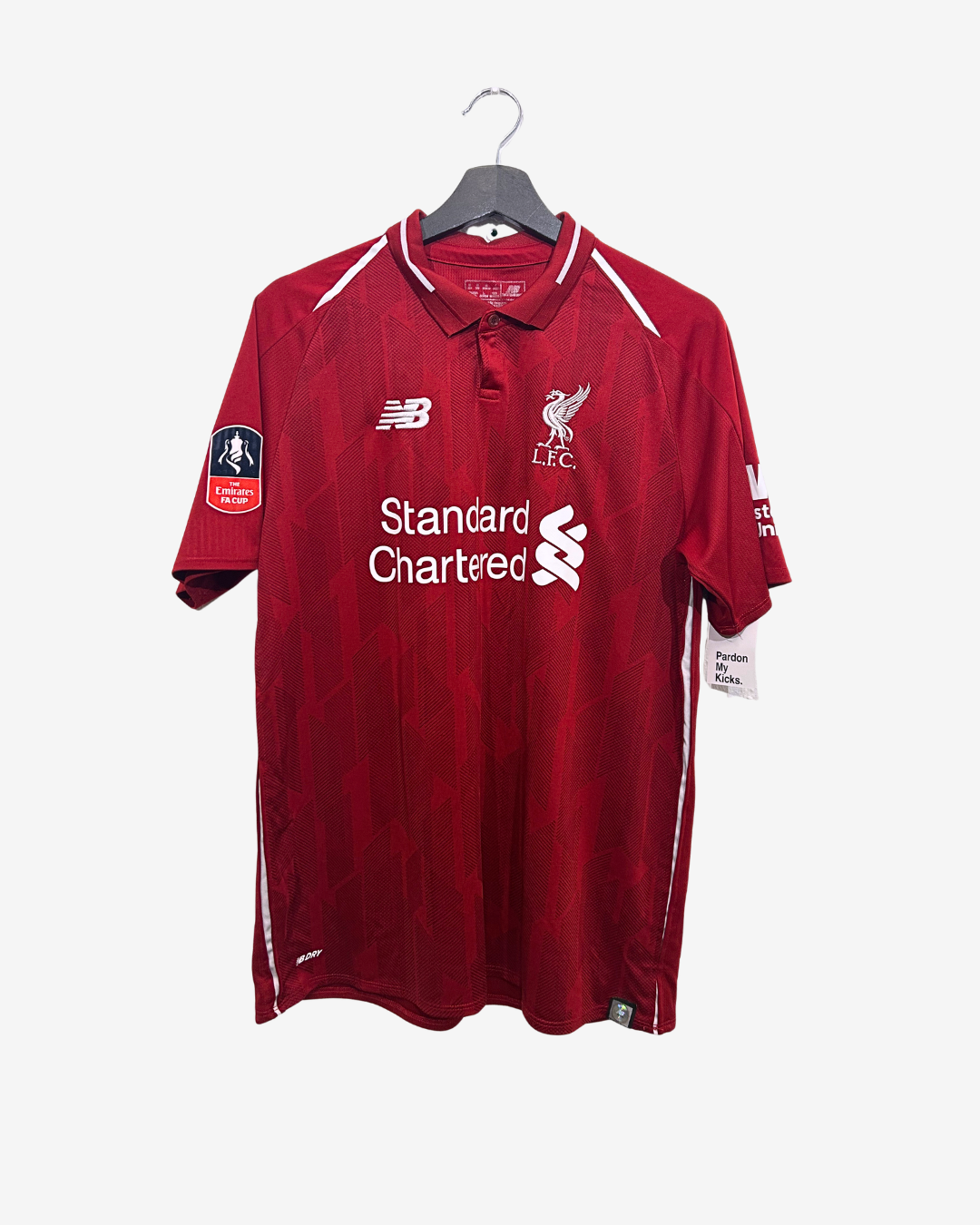 Red sports jersey with branding on a hanger against a white background