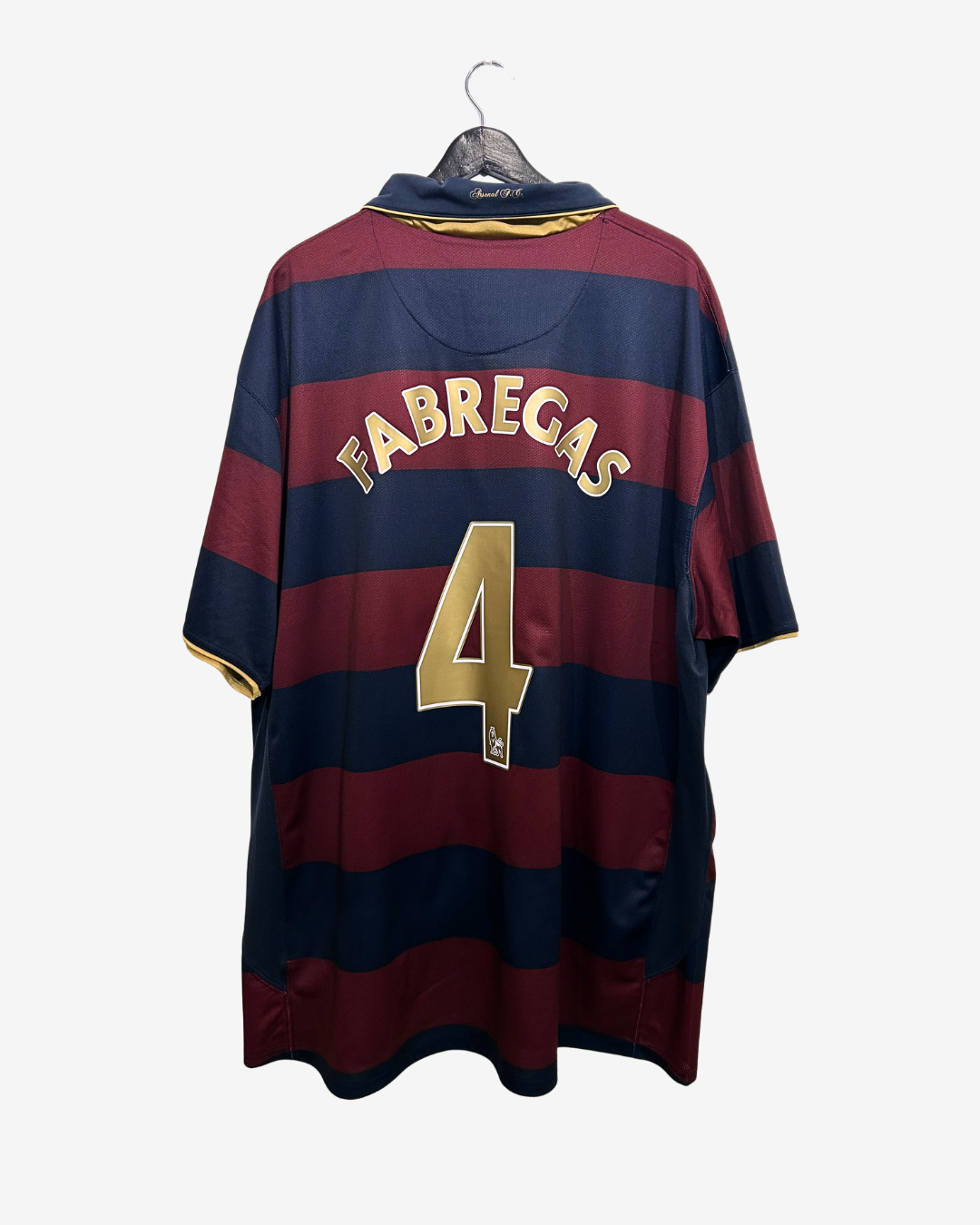 Maroon and navy striped sports jersey with 'Fabregas' and number '4' on a white background