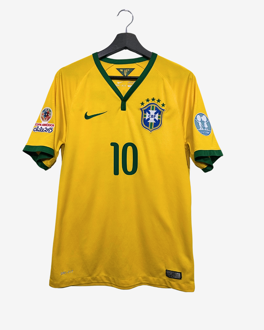 Yellow soccer jersey with number 10 on a hanger against a white background
