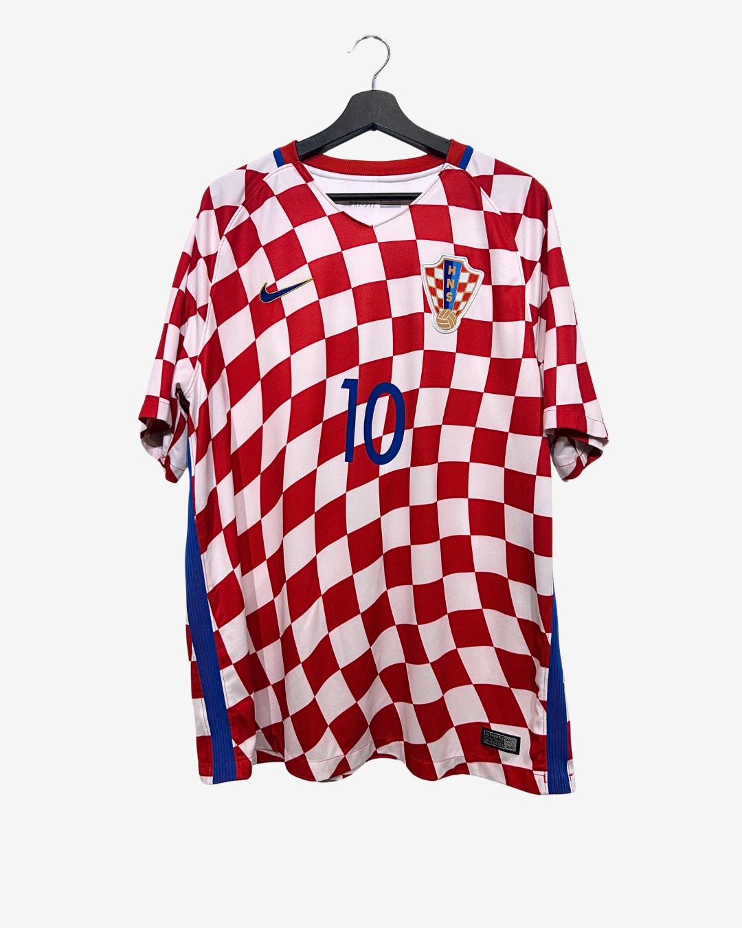 Red and white checkered sports jersey with number 10 on a hanger against a white background