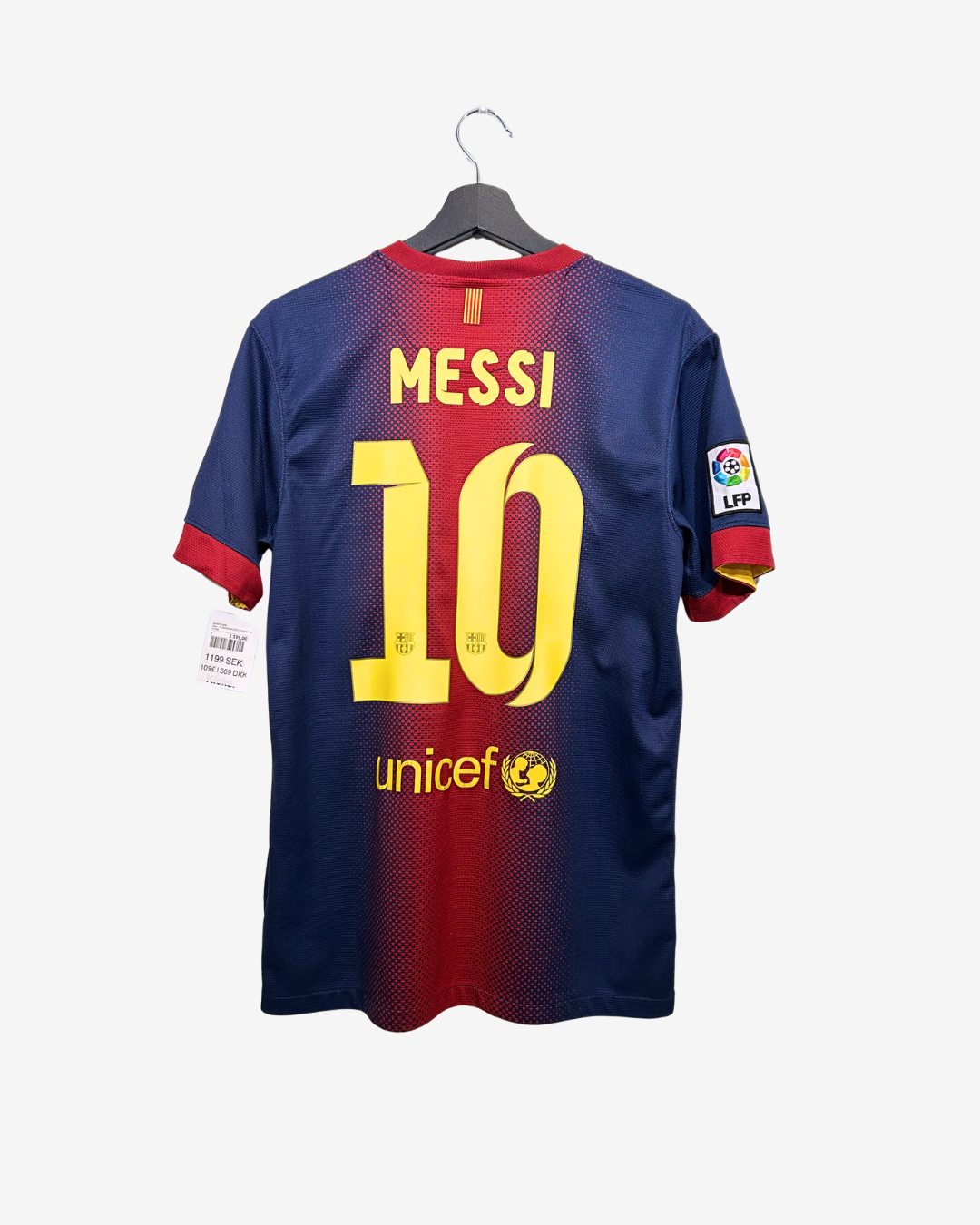 FC Barcelona jersey with Messi's name and number on a hanger