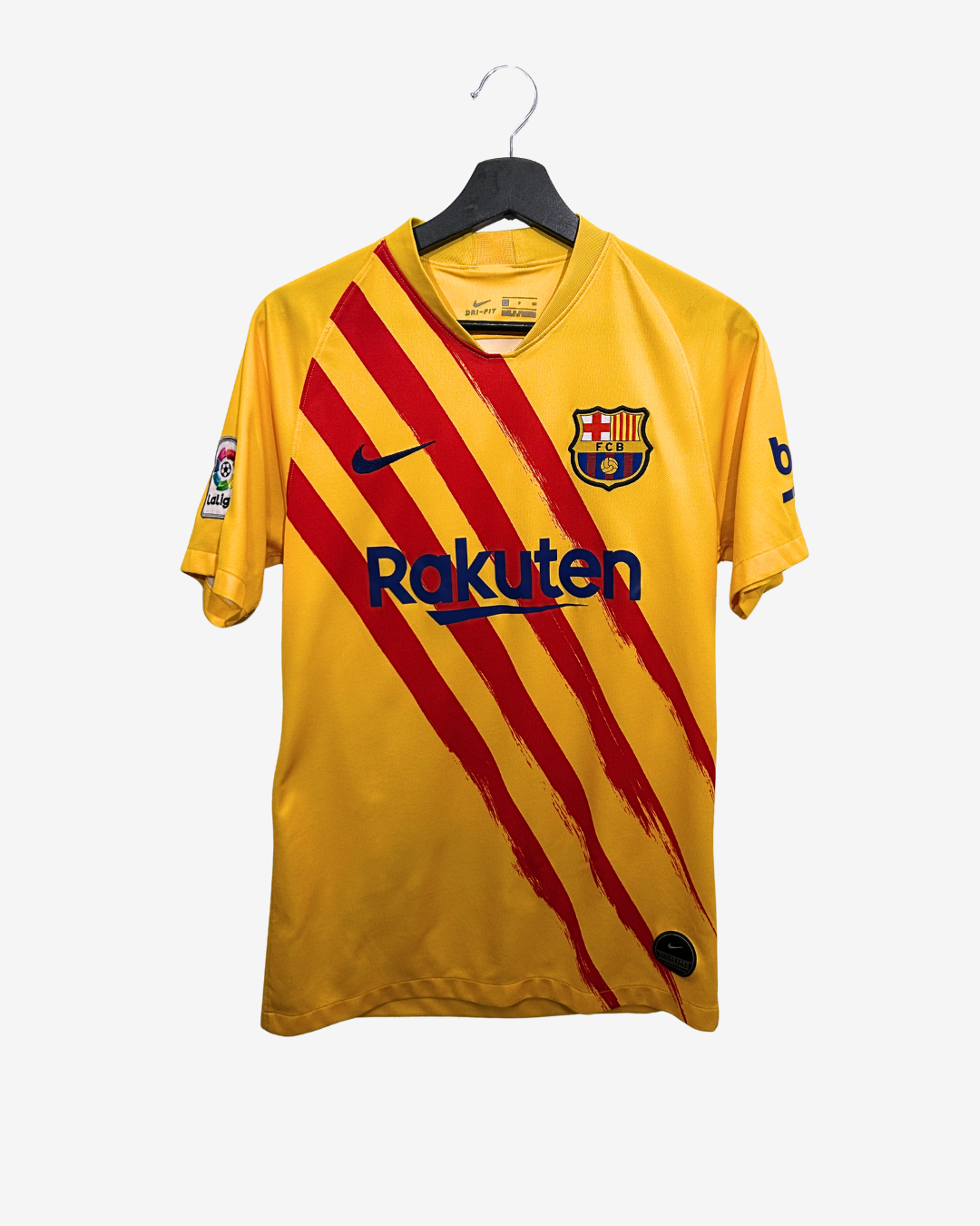 Yellow sports jersey with red stripes and visible branding on a white background