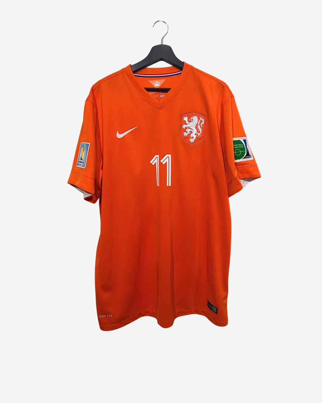 Orange soccer jersey with number 11 on a hanger against a white background