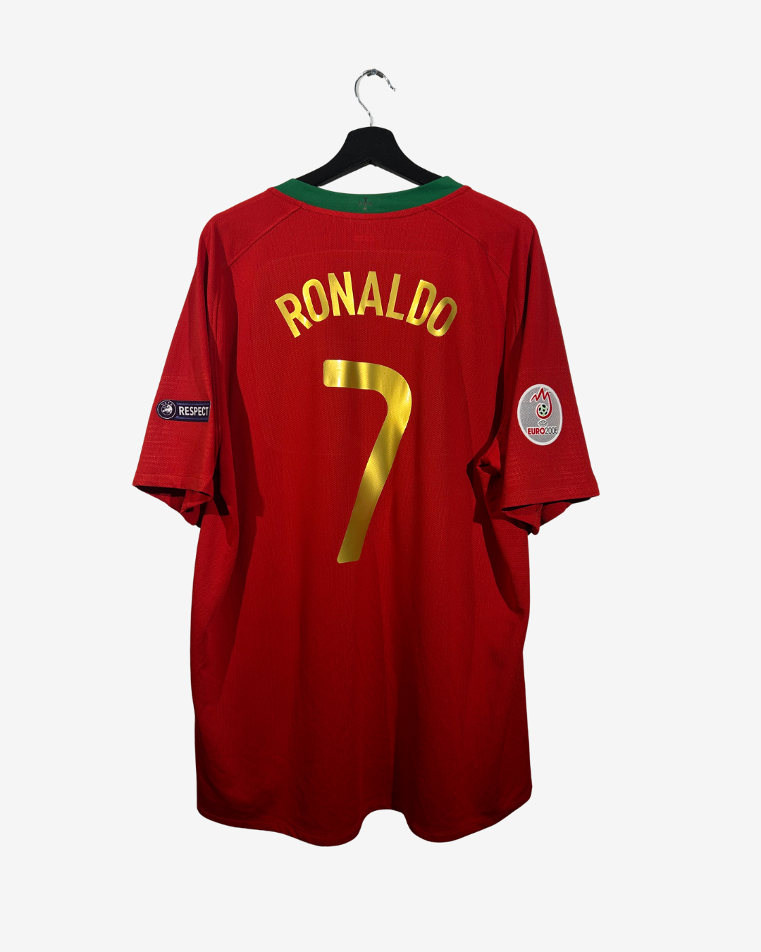Red sports jersey with 'RONALDO' and number '7' on a hanger against a white background