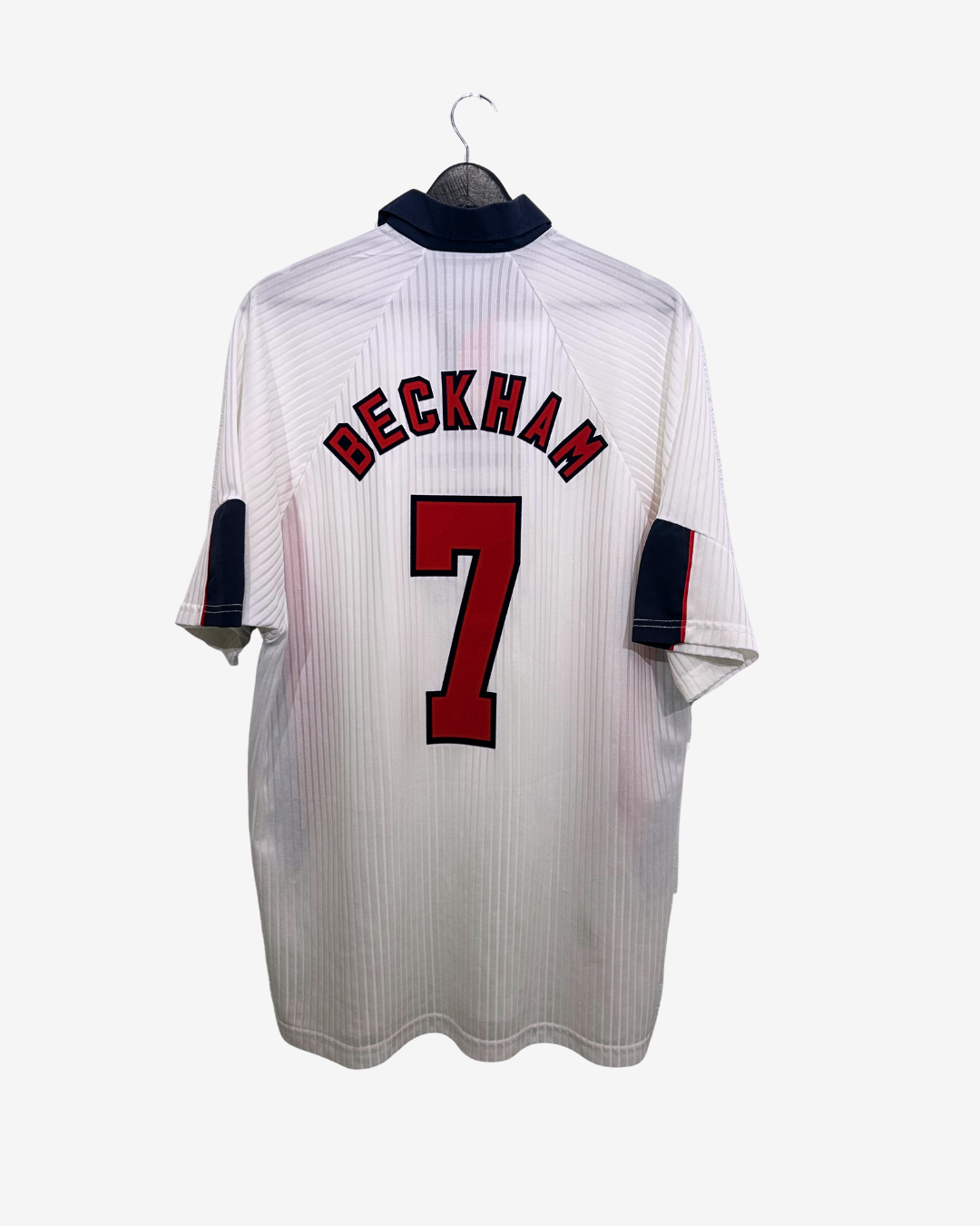 White sports jersey with 'Beckham' and number '7' on a white background