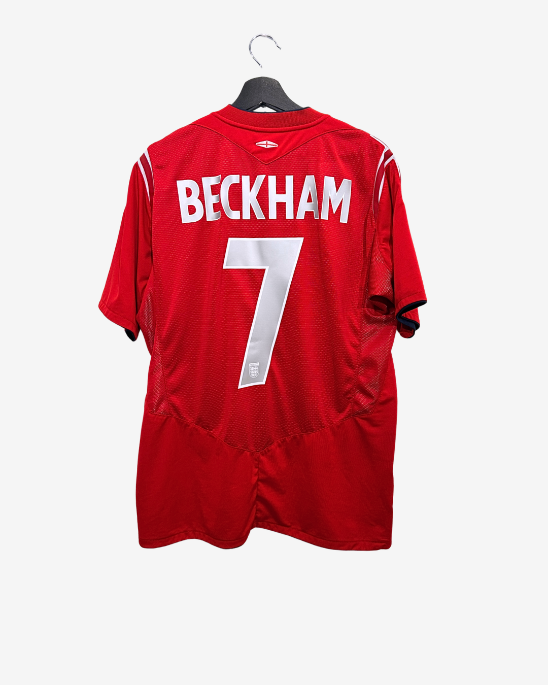 Red sports jersey with 'Beckham' and number '7' on a white background