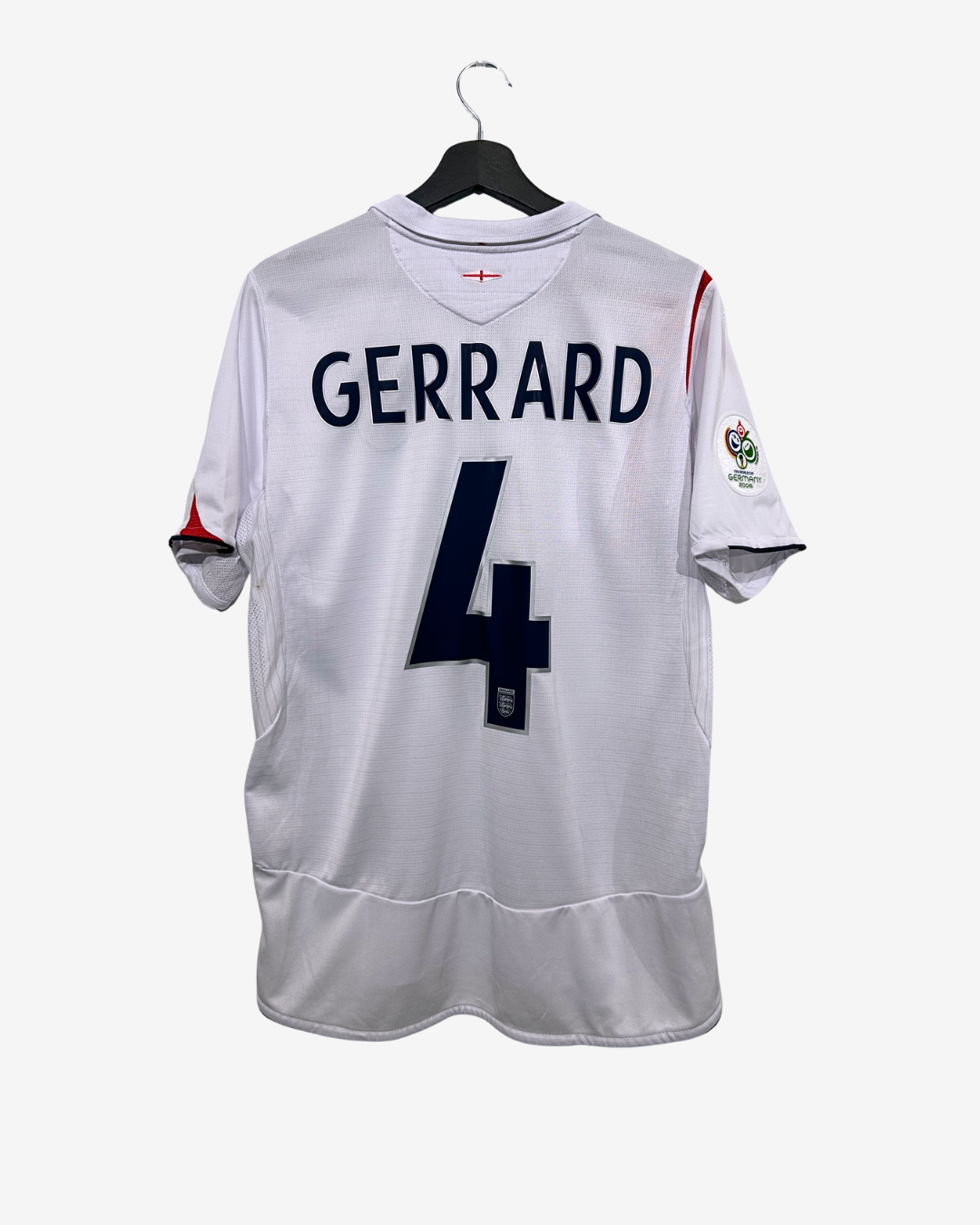 White sports jersey with 'Gerrard' and number '4' on a white background