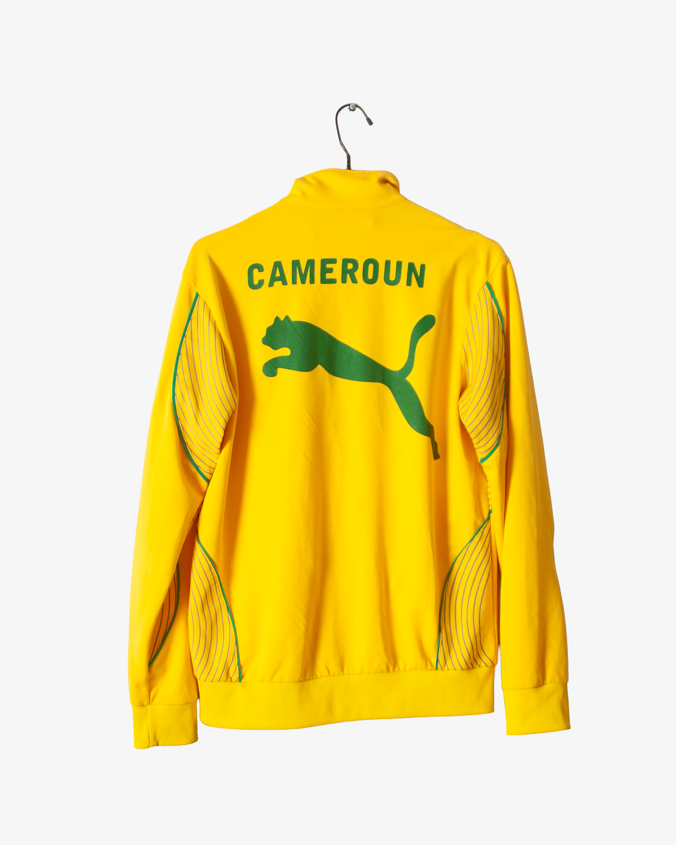 Yellow jacket with 'Cameroun' text and Puma logo on a white background