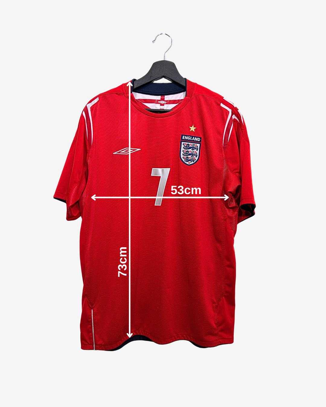 Red sports jersey with measurements on a white background