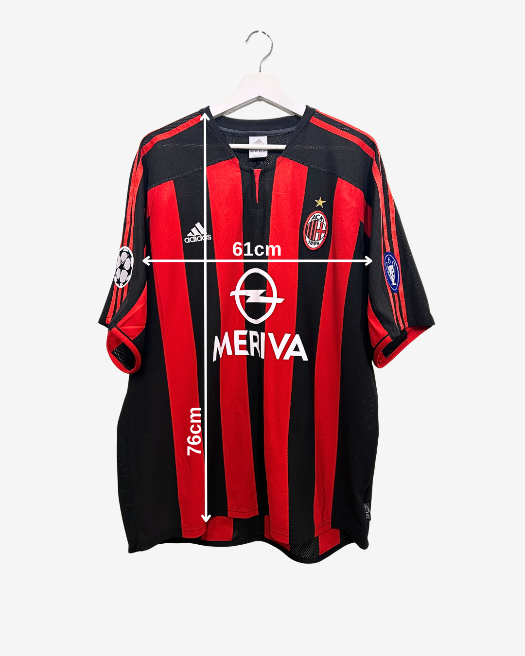 Black and red striped sports jersey with measurements on a white background