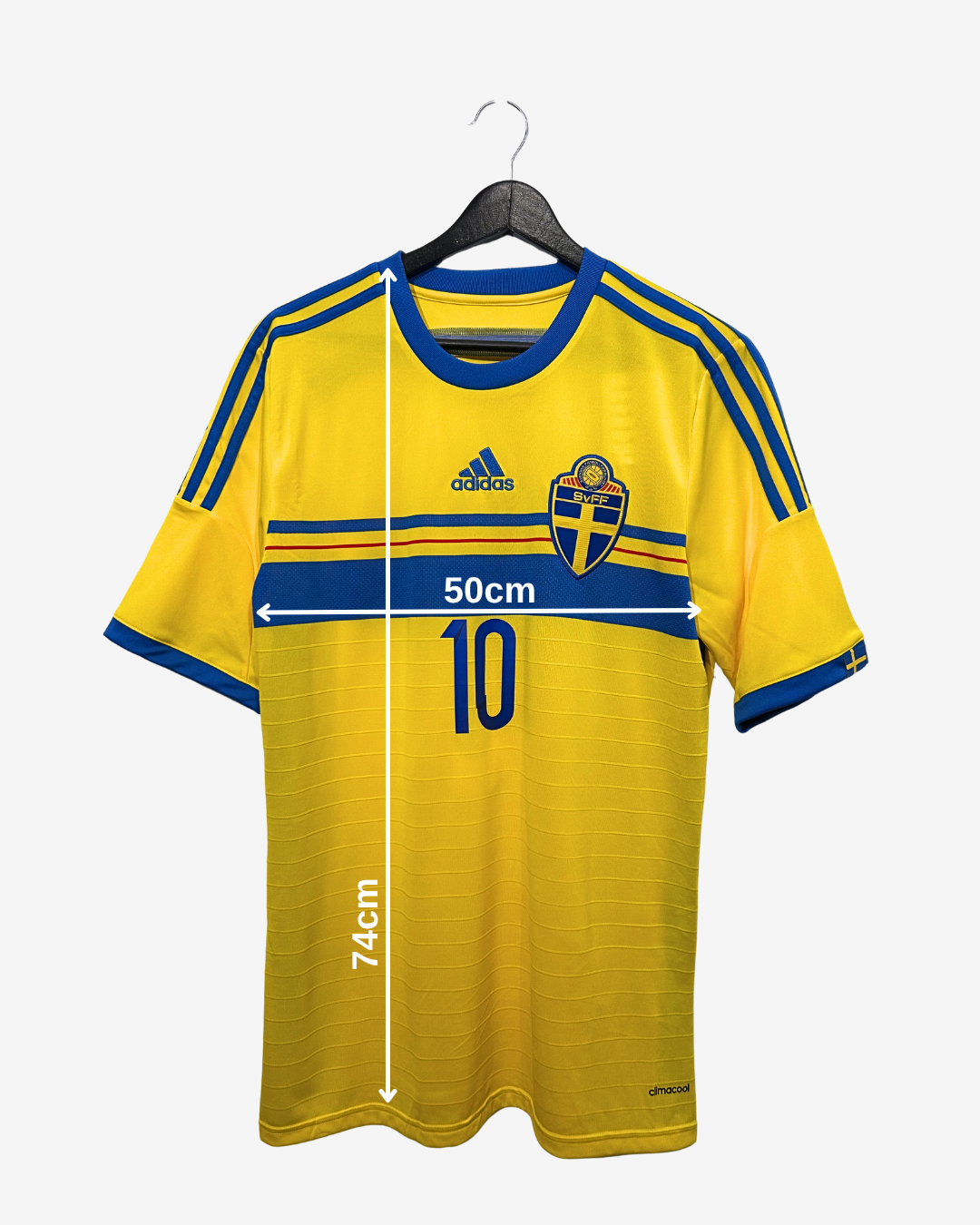 Yellow sports jersey with blue accents on a hanger, featuring Adidas logo and measurement details.