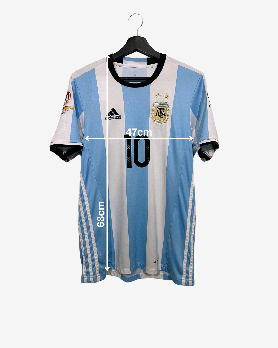 Argentina soccer jersey on a hanger with measurements indicated