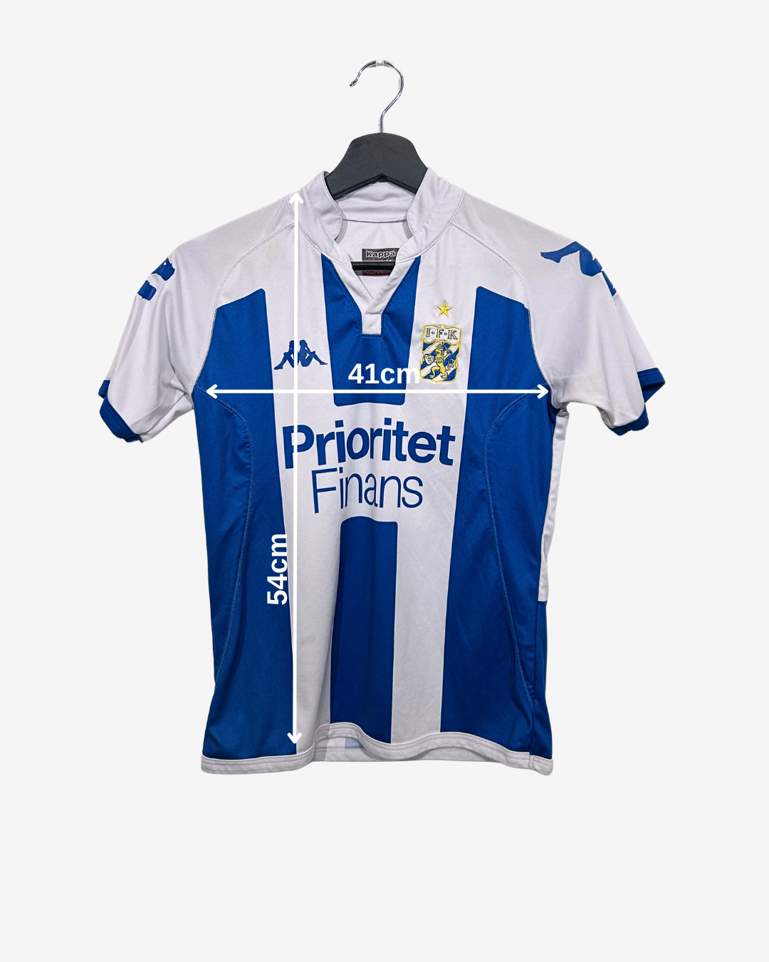 Blue and white sports jersey on a hanger with visible branding and text.