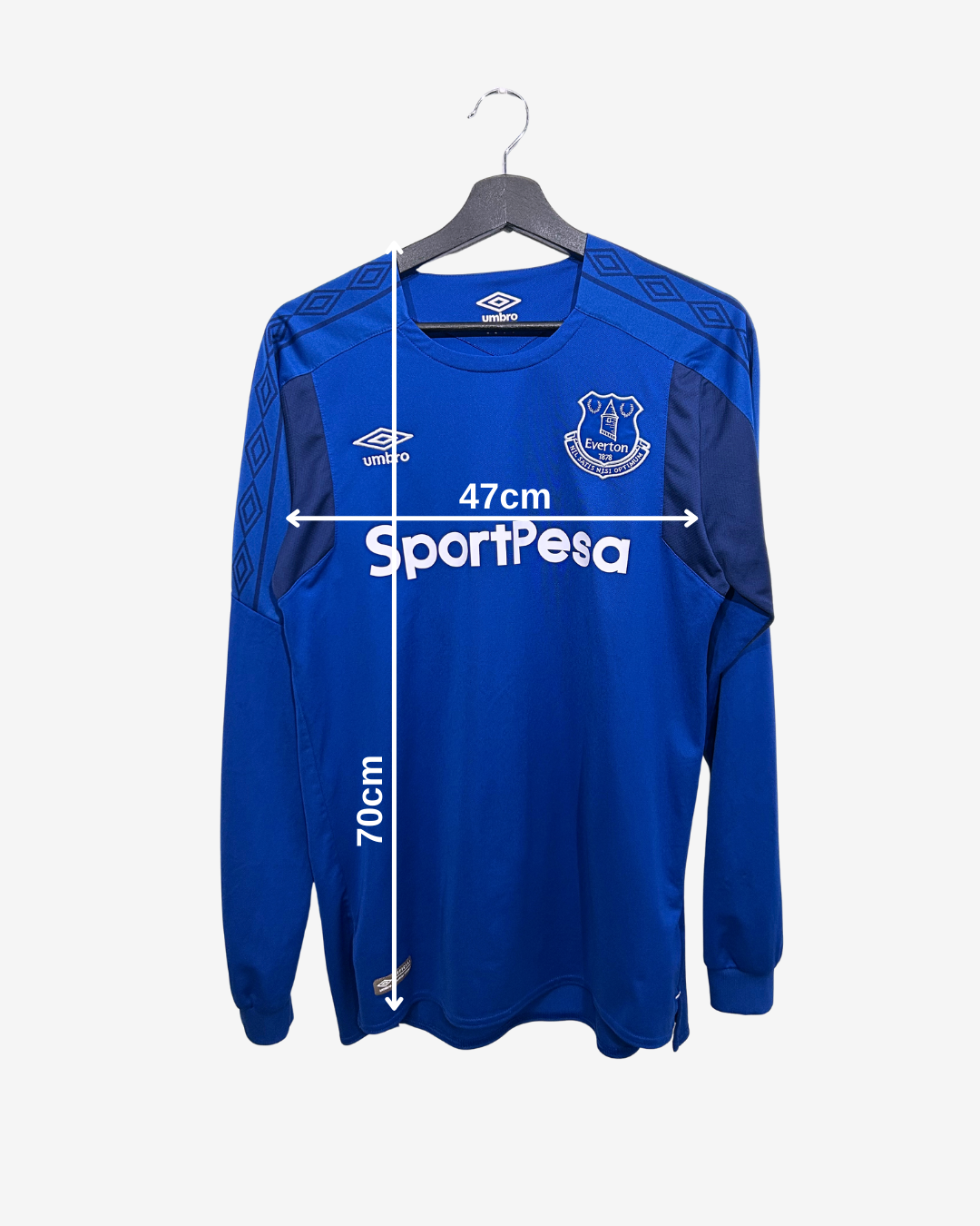 Blue sports jersey with measurement markings on a white background