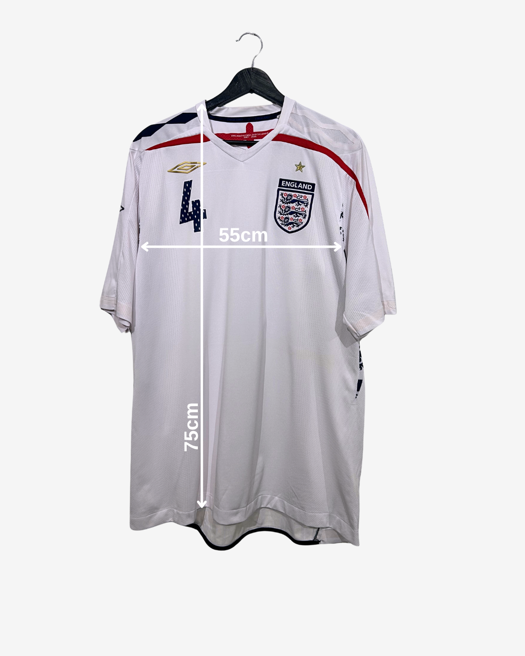 White sports jersey with measurements on a white background