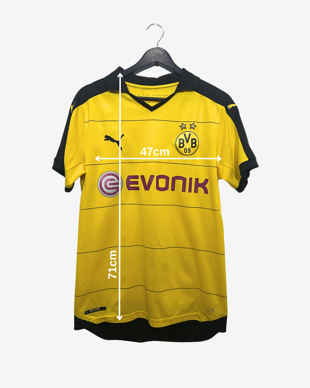 Yellow sports jersey with black accents on a hanger, featuring branding and measurements.