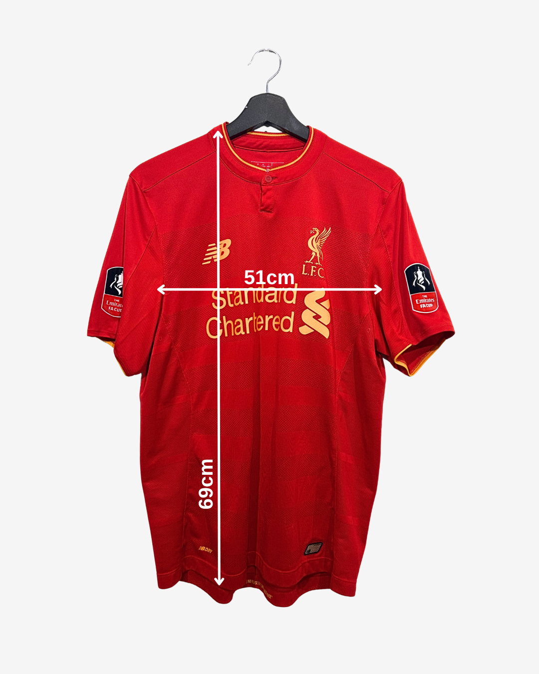 Red sports jersey with measurements on a white background