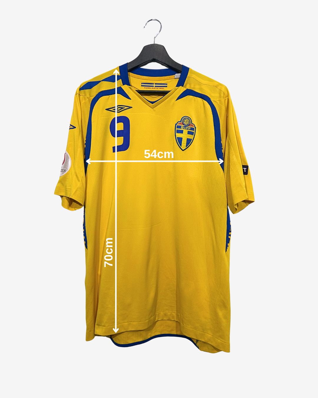 Yellow sports jersey with blue accents, number 9, and Swedish flag on a hanger with measurements.