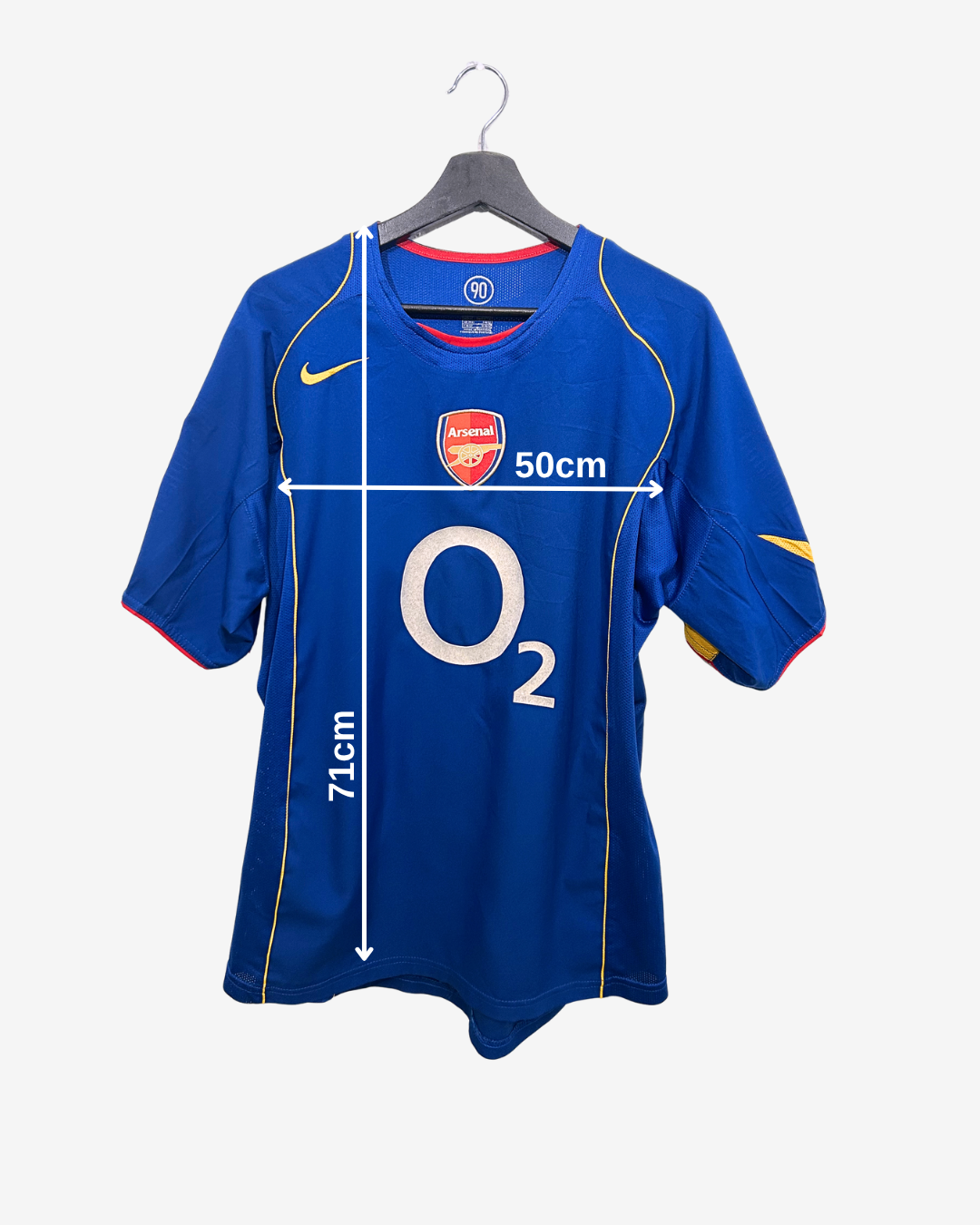 Blue sports jersey with measurements on a white background
