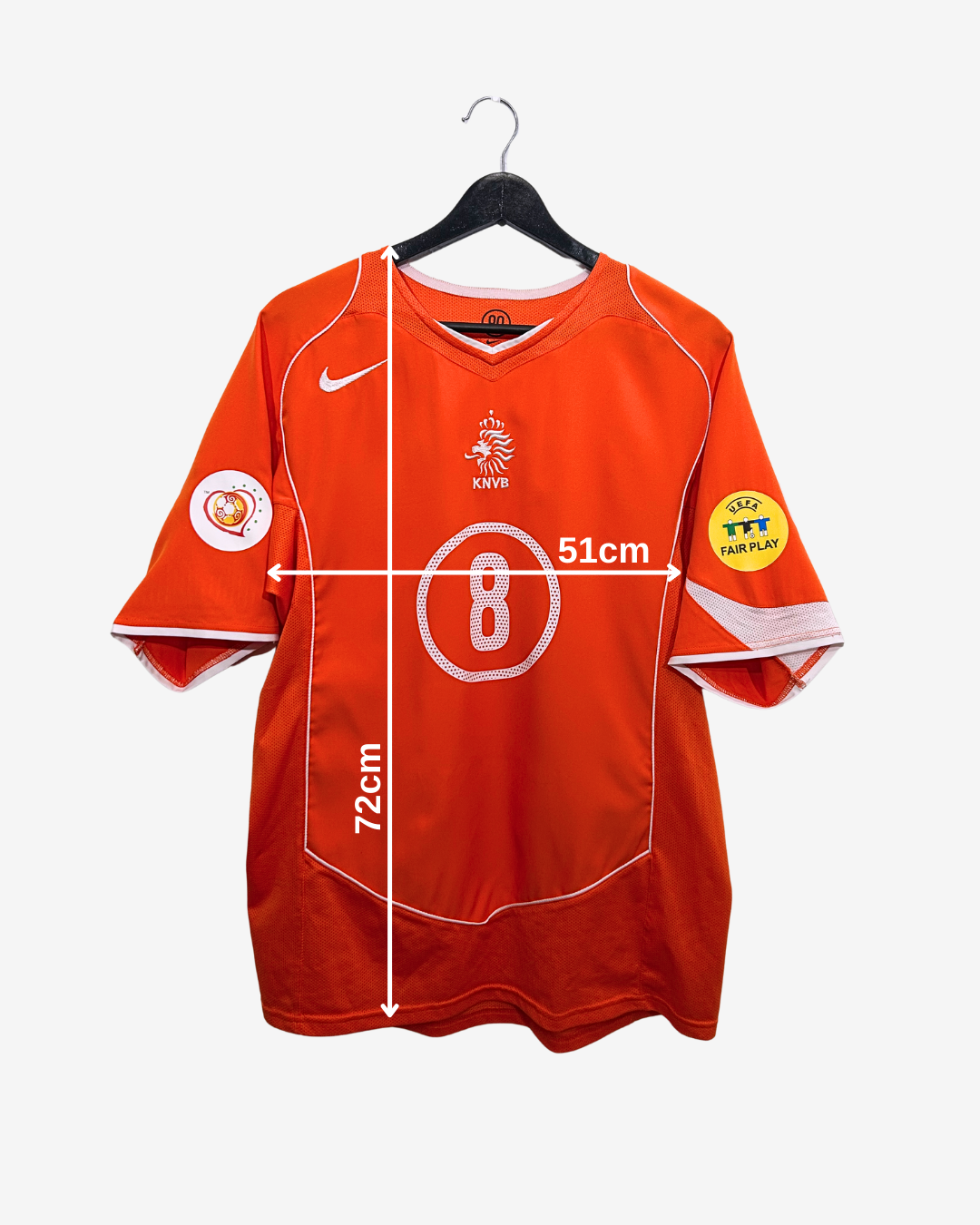 Orange sports jersey with measurements on a white background