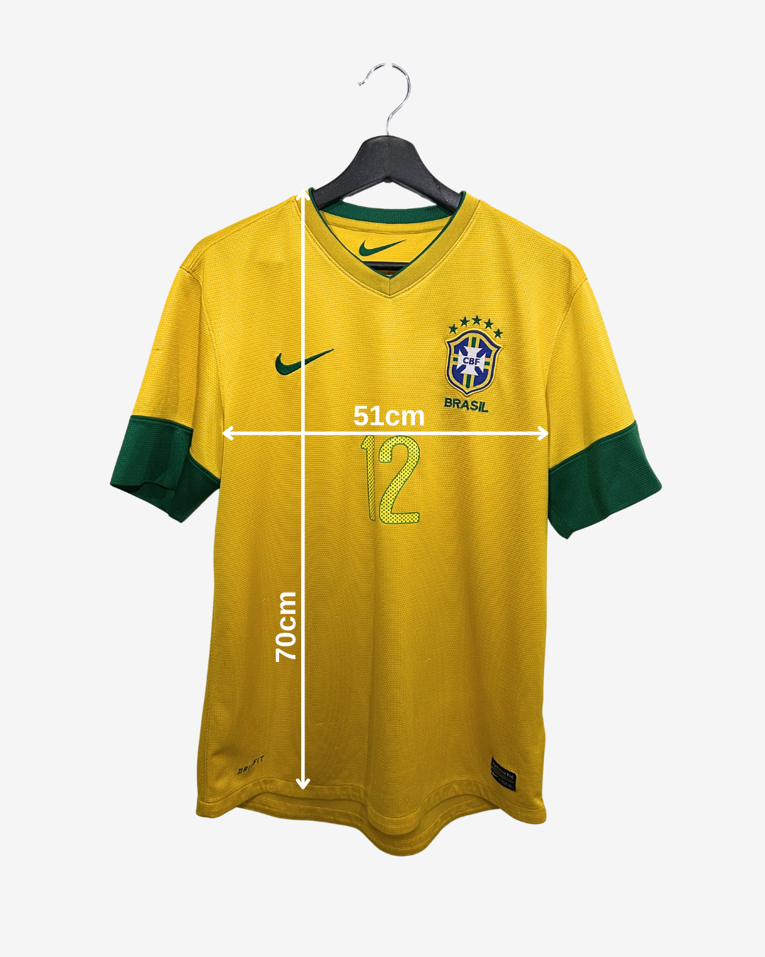 Yellow soccer jersey with green accents on a hanger, featuring measurements.