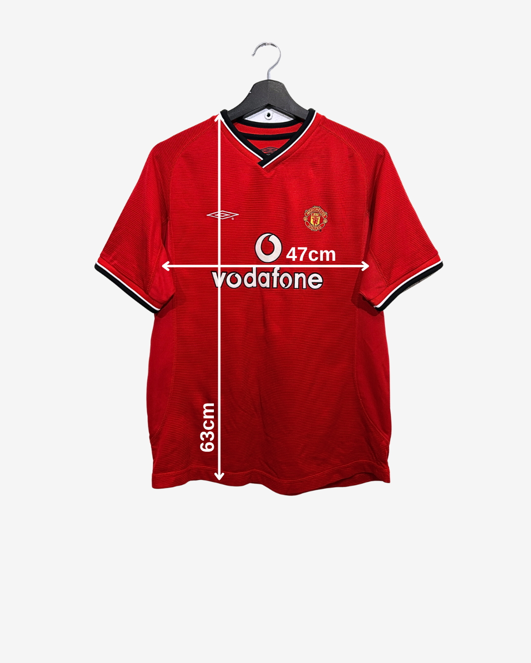 Red sports jersey with measurements on a white background