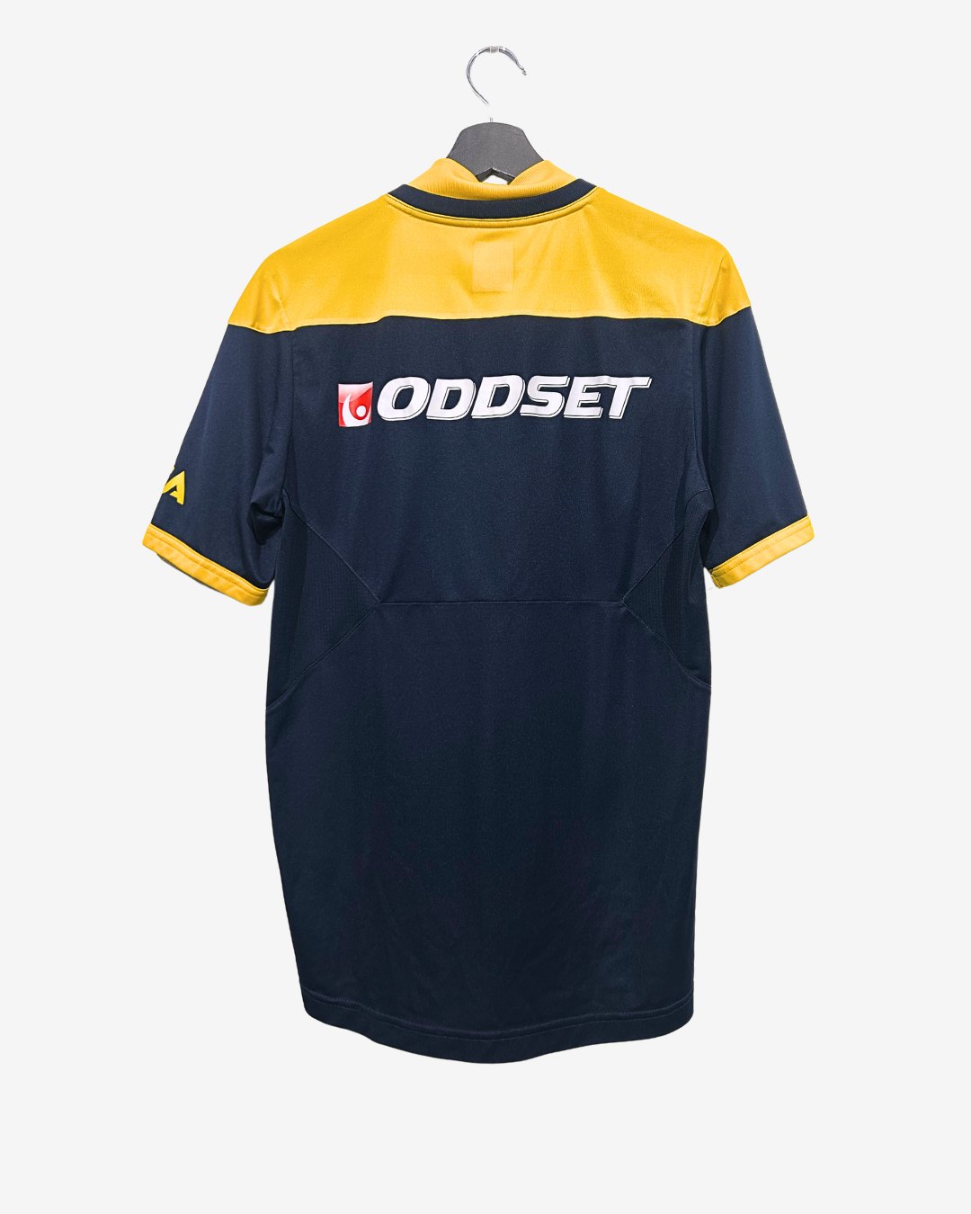 Navy and yellow sports jersey with 'Oddset' logo on a hanger