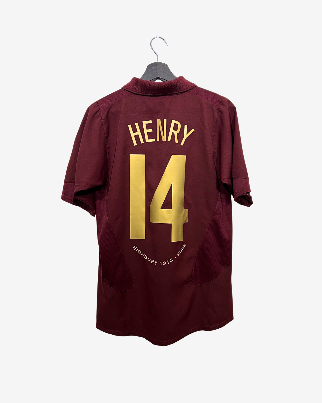Maroon sports jersey with 'HENRY 14' printed on a hanger against a white background